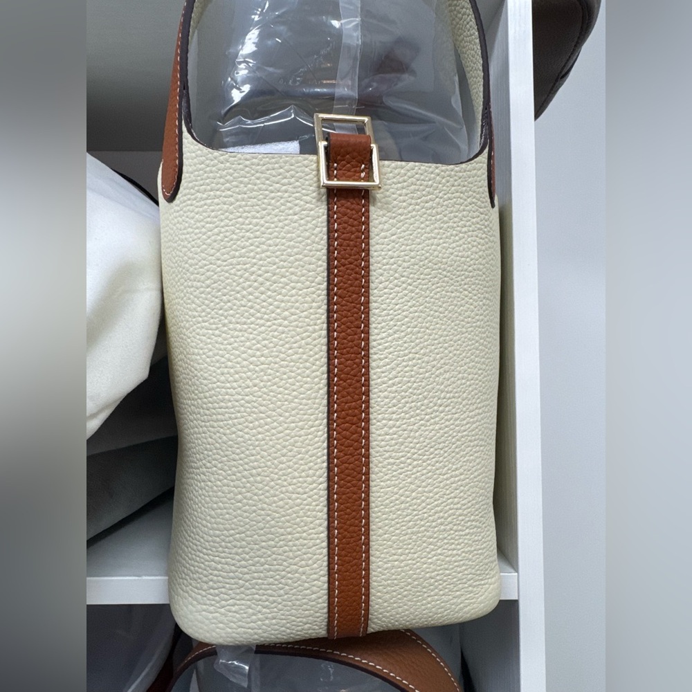 Genuine Cow hide leather .